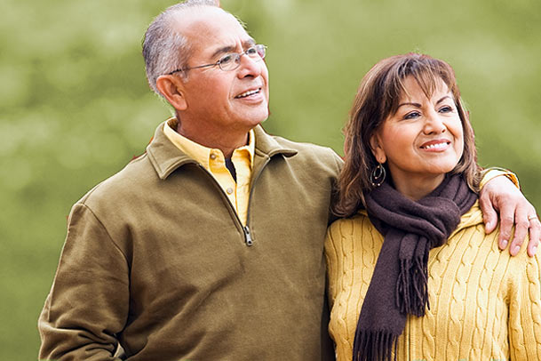 Two friendly older people smiling